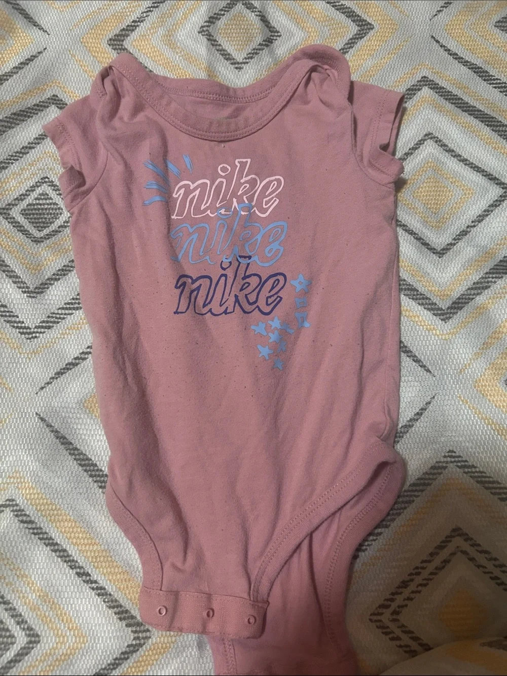 Nike Pink Baby Girls One-Piece Bodysuit with Blue Logo Accents